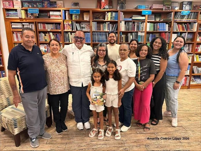 Large group photo of family and friends who attended the presentation