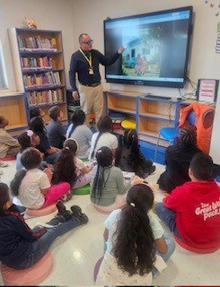 Second graders listening during the author visit at Northern Parkway Elementary School