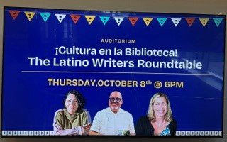 Auditorium signage announcing the Latino Writers Roundtable