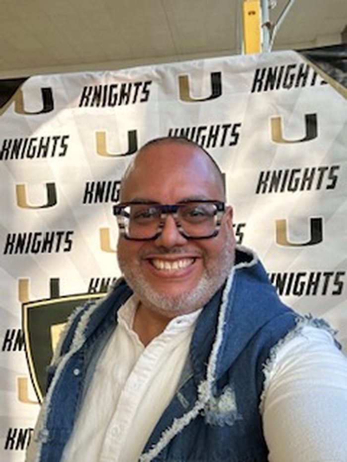 Edward Rodriguez in front of the Uniondale Knights backdrop